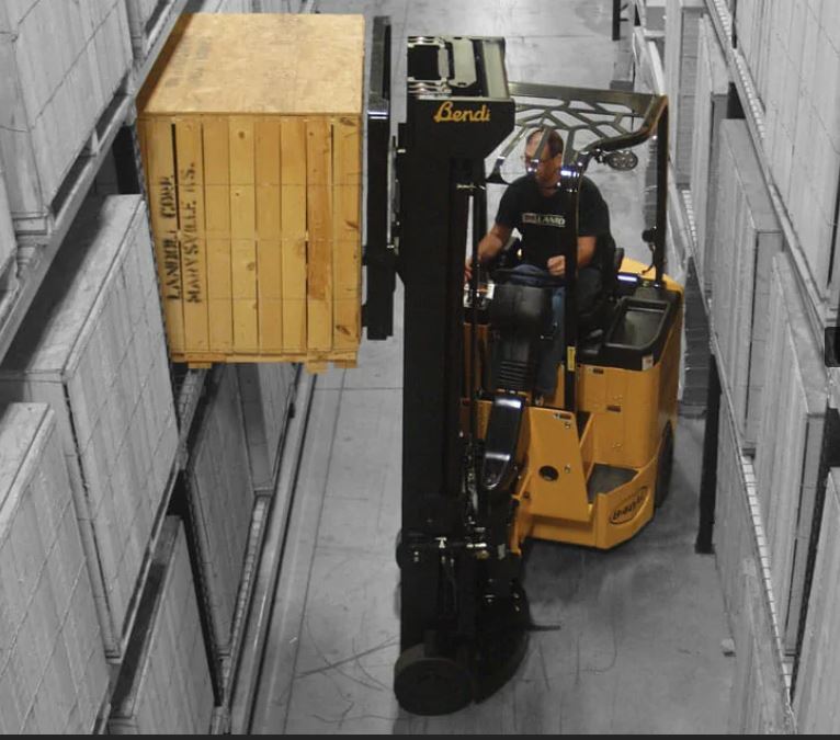 Thermoformed black textured protective cover on a Landoll fork lift.