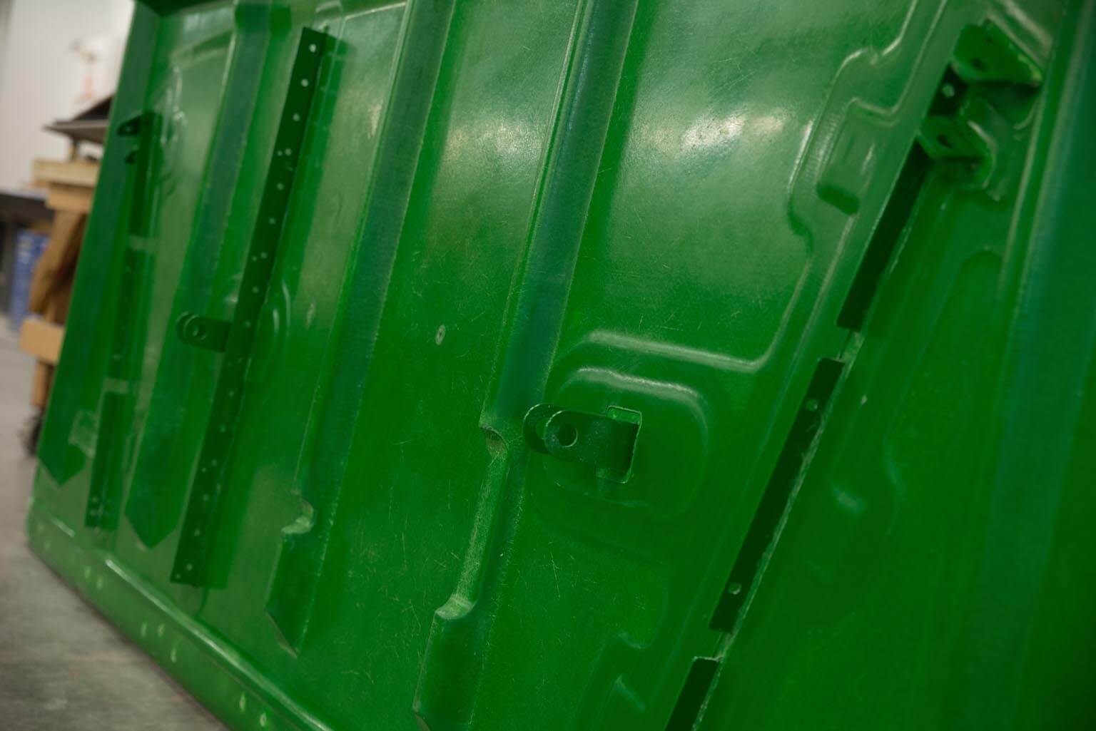 Grain tank extension panel made with our patented TEC (Tooless Engineered Composite)® process which can incorporate steel brackets and foam for structure.
