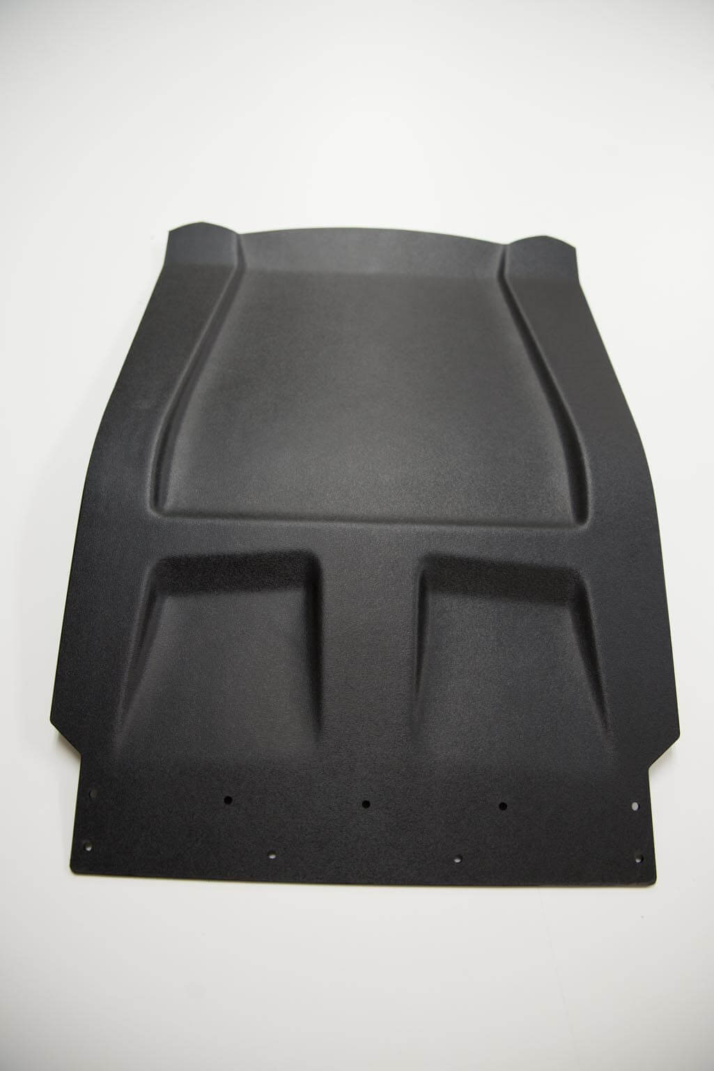 Vacuum forming polyethene snow flap for a Polaris snowmobile.