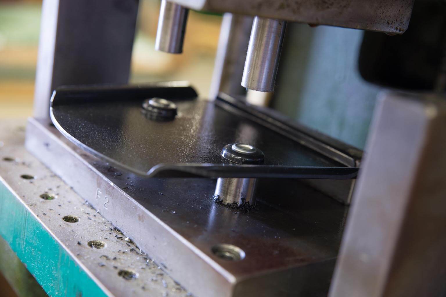 Installing rivet nuts into a thermoformed part.