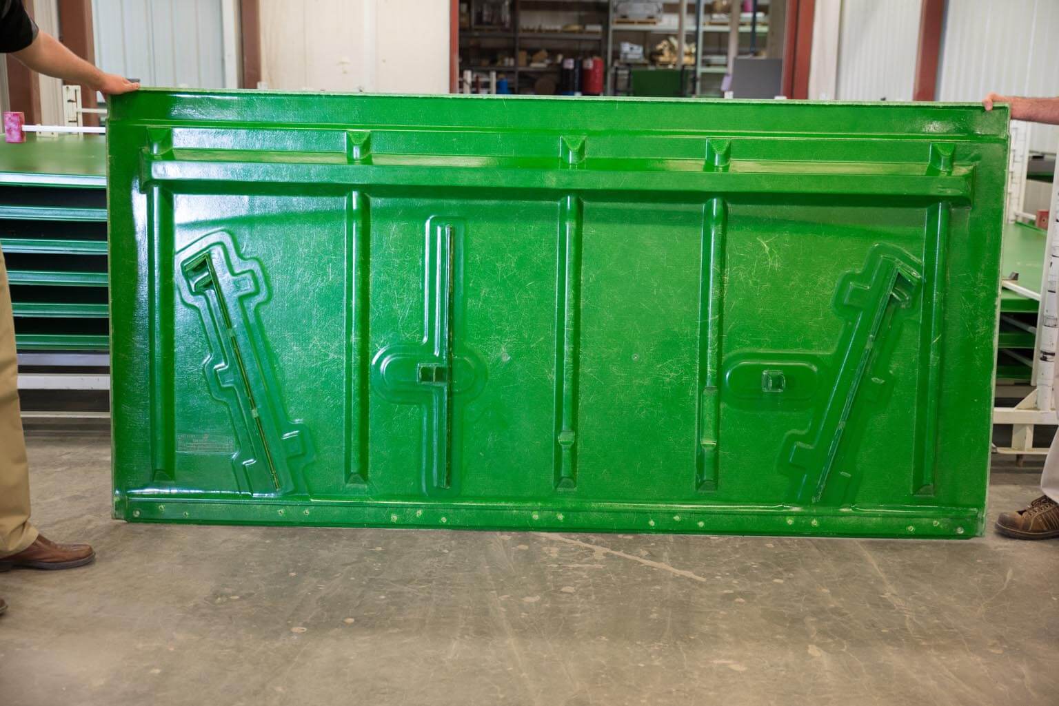 Grain tank extension panel made with our patented TEC (Tooless Engineered Composite)® process which can incorporate steel brackets and foam for structure.